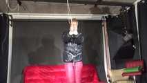 Watching sexy Pia being tied and gagged overhead with ropes and a clothgag wearing a sexy red/black crazy sensation combination (Video)