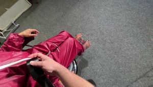 Ms Ungeniert tied gagged and played with in shiny nylon Rainwear part 1/2