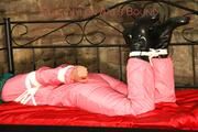Mara tied and gagged on a princess bed in an old cellar wearing supersexy shiny pink downwear (Pics)