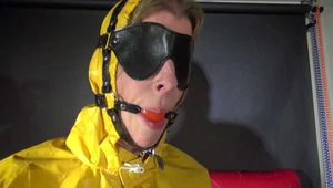 Sexy Pia being tied and gagged on a chair wearing sexy shiny nylon rainwear (Video)