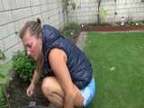Get a video with Sandra gardening in her shiny nylon Downvest