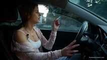 Meet Anastasia in her car while she is smoking two 120mm all white cigarettes