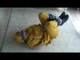 03:20 Min. video with Katharina bound in a yellow rainsuit
