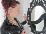 Special pictures of Mistress Nycky in a vinyl dress