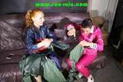 Ronja and Stella destroying shiny nylon rainwear both wearing that stuff (Pics)