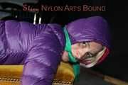 Watching sexy Sonja being tied and gagged with ropes and a cloth gag on a stool wearing a sexy shiny nylon rain pant and a purple down jacket (Pics)