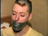 PUNK GIRL MELA GETS WRAP TAPE GAGGED, DUCT TAPE TIED, BAREFOOT, TOE TIED WITH TAPE & GAG TALKS (D60-8)