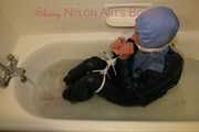 Watching Stella being tied and gagged with ropes and a cloth gag in a bathtub diving under water (Pics)