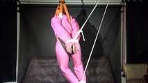 Sexy ***SANDRA*** wearing a hot pink oldschool downbib and a down jacket being tied and gagged with ropes and a clothgag hanging on the ceiling  (Video)