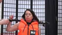 Handcuffed in life jacket