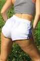 Watch Chloe enjoying her shiny nylon Shorts outside at a sunny Day