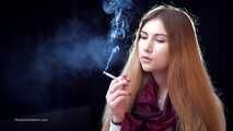 Mysterious girl Valya poses on camera with a tasty 120mm cigarette