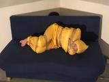Two videos of our archive girls tied and gagged in shiny nylon rainwear