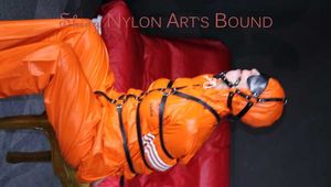 Sexy Pia being tied and gagged with belts a eye patch and a ballgag on a chair wearing a supersexy oldschool orange rainsuit (Pics)