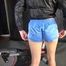 Watching sexy SONJA wearing a sexy blue shiny nylon shorts and a rainjacket during her workout on the hometrainer (Video)
