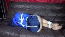 Sexy Sonja being tied and gagged on a sofa with ropes and a clothgag wearing a sexy oldschool blue shiny nylon shorts and a blue rain jacket (Video)