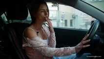 Meet Anastasia in her car while she is smoking two 120mm all white cigarettes