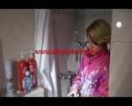 Sonja foaming her shiny nylon down suit with shaving cream in the shower (Video)