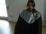 5 short Videos with Katharina tied and gagged in shiny nylon rainwear from 2005-2008