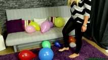 barefeet popping of party balloons