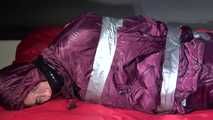 Pia being tied and gagged with tape on a sofa wearing sexy purple shiny nylon downwear (video)