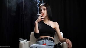 Slim chick is smoking two Reds