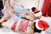 [From archive] Lucky, Nelly, Xenia - Santa’s little helpers hogtied and wrapped up on a bed 2