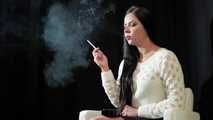 Watch lovely Tanya lighting up and smoking a 120mm Cigaronne