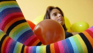 Playing with balloons in cameltoe panties