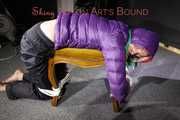 Watching sexy Sonja being tied and gagged with ropes and a cloth gag on a stool wearing a sexy shiny nylon rain pant and a purple down jacket (Pics)