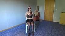 Shelli cuffed and gagged on a chair 1/2