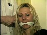 29 Yr OLD SEXY ROMANIAN TAPES AND CLEAVE GAGS HERSELF, HOPS AROUND THE ROOM BAREFOOT & IS CLEAVE GAGGED 3 MORE TIMES (D53-12)