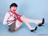 Rozanka - Leggy brunette rocks a schoolgirl uniform during her bondage shoot