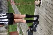 Watching Pia sweeping the terrace wearing a sexy black shiny nylon shorts, a striped top and black rubber boots (Pics)