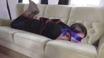 Vanessa hogtie on couch 2/2