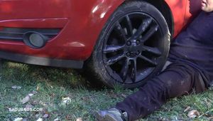 Mistress Cleo smokes and smashes balls with a car CBT version