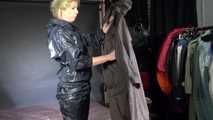 Watching sexy Pia wearing a sexy black shiny nylon jumpsuit reordering rainwear (Video)