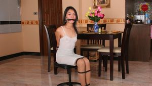 Cute Bound and Gagged Asian is Sitting on the Stool all Helpless and Ready