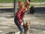 Katharina take a walk with her dog wearing a sexy red shiny down jacket (Video)