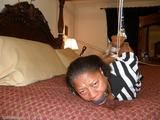 Suspended hogtie