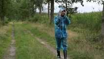 Miss Petra goes for a walk in PVC raingear and rubber boots