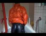 SEXY SANDRA wearing an special orange down jacket and a black down pants during taking a bath playing with water and the downwear (Video)