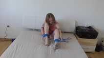Maria roped on her bed 2/2