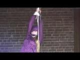 03:15 Min. video with Katharina tied and gagged in shiny nylon rainwear