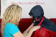 Jill tied, gagged and hooded by Sophie wearing a sexy red/blue rainwear combination (Video)