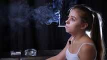 Lovely girl Irina enjoys the moment while smoking a cigarette