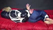 Watch Sonja beeing bound and gagged in her shiny nylon Downwear