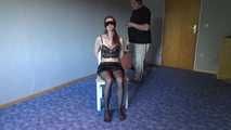 Shelli cuffed and gagged on a chair 1/2
