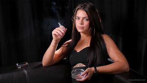 Gorgeous smoker Asya loves smoking on camera