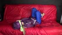 SANDRA being tied and gagged on a sofa with ropes and a clothgag wearing a sexy blue shiny nylon rain pants and a purple rain jacket  (Video)